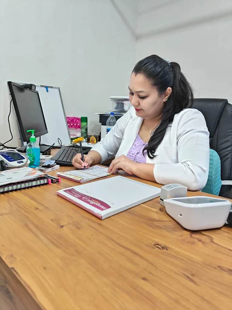 At the clinic — reviewing a patient’s case notes